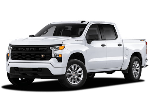 Picture of a white, 2022 Chevrolet Silverado Custom pickup truck from the front, driver's side corner.